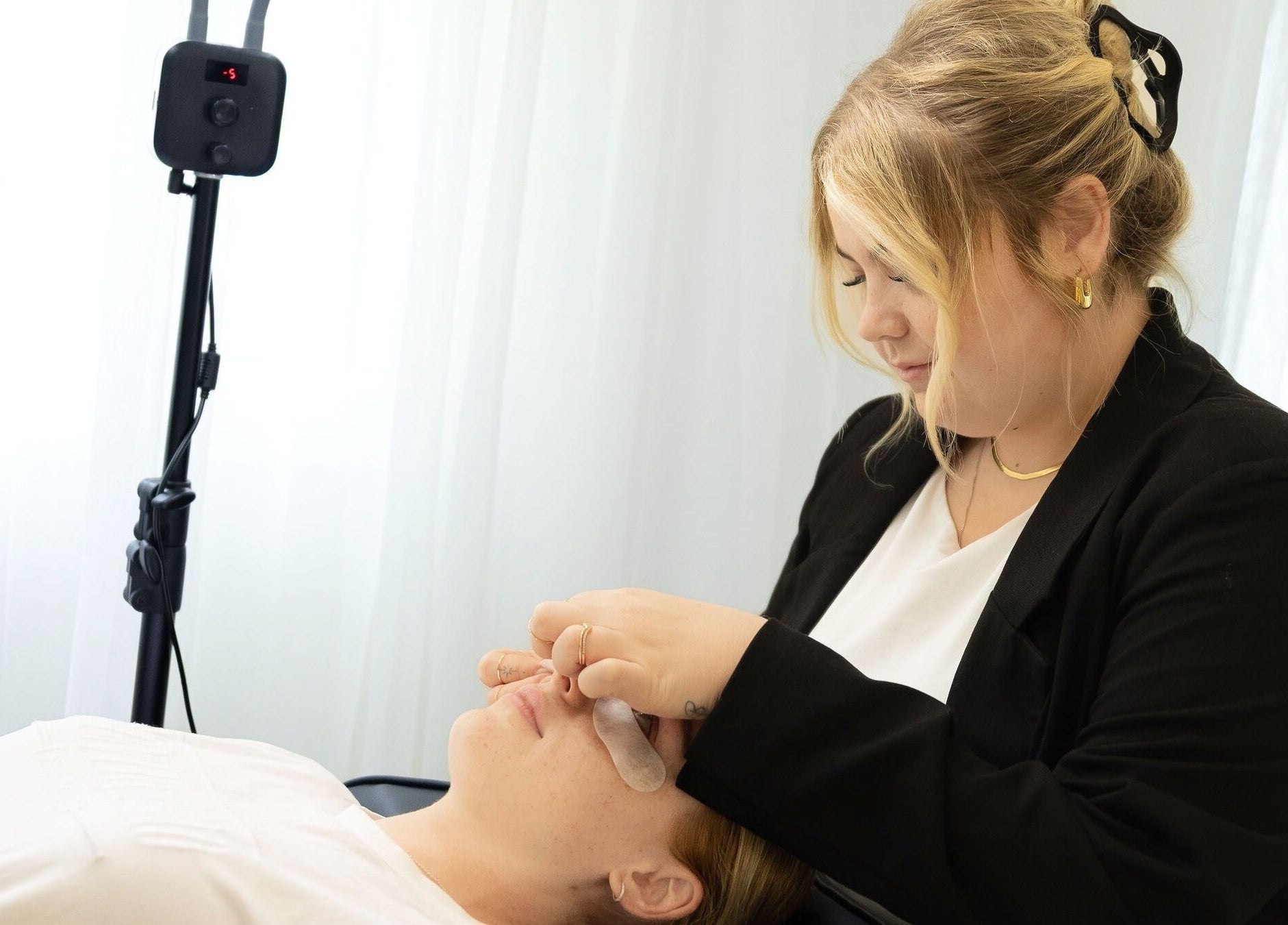 Professional performing lash service at Iconic Lash & Brow, Woongarrah, New South Wales, AU.