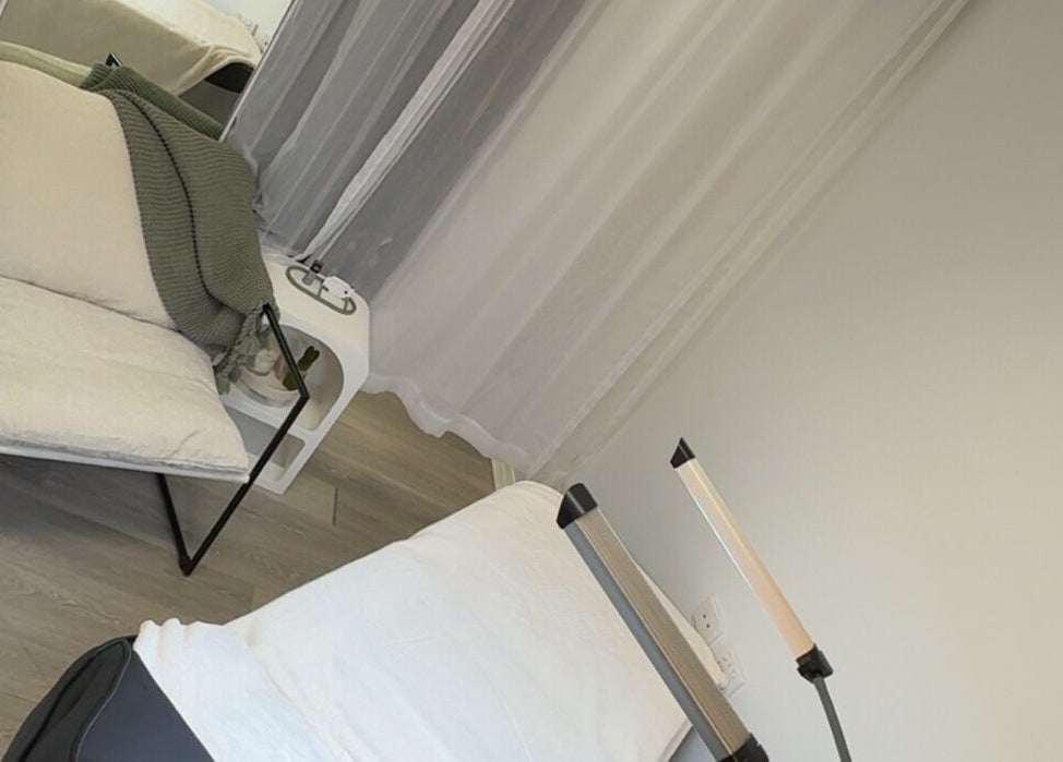 Relaxing treatment space at Iconic Lash & Brow, Woongarrah, New South Wales, AU with inviting chair and decor.