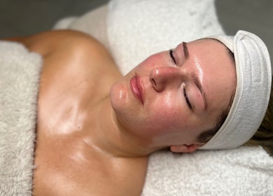 Facial treatment at Be Beau Boutique, Paignton, England, GB showcasing a rejuvenated, relaxed client.