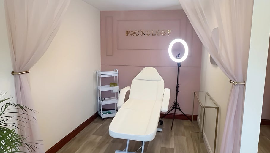 Tranquil treatment room at Faceology - Hythe, Hythe, Lympne, England, GB featuring a chic spa bed.