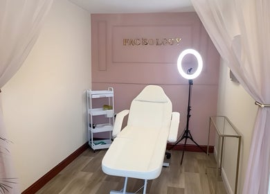 Tranquil treatment room at Faceology - Hythe, Hythe, Lympne, England, GB featuring a chic spa bed.