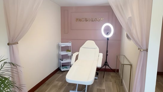 Tranquil treatment room at Faceology - Hythe, Hythe, Lympne, England, GB featuring a chic spa bed.