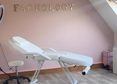 Elegant spa room at Faceology - Hythe in Hythe, Lympne, England, GB featuring a treatment bed and calming decor.