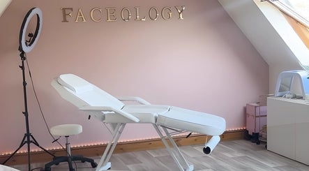 Elegant spa room at Faceology - Hythe in Hythe, Lympne, England, GB featuring a treatment bed and calming decor.