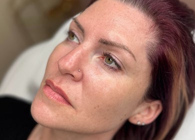 Close-up of a serene face at Faceology - Hythe, Lympne, England, GB showcasing radiant skin.
