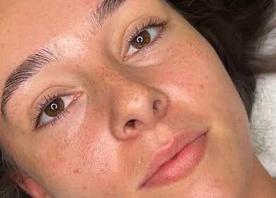Close-up of a relaxed face with smooth skin at Faceology, Lympne, Hythe, England, GB.