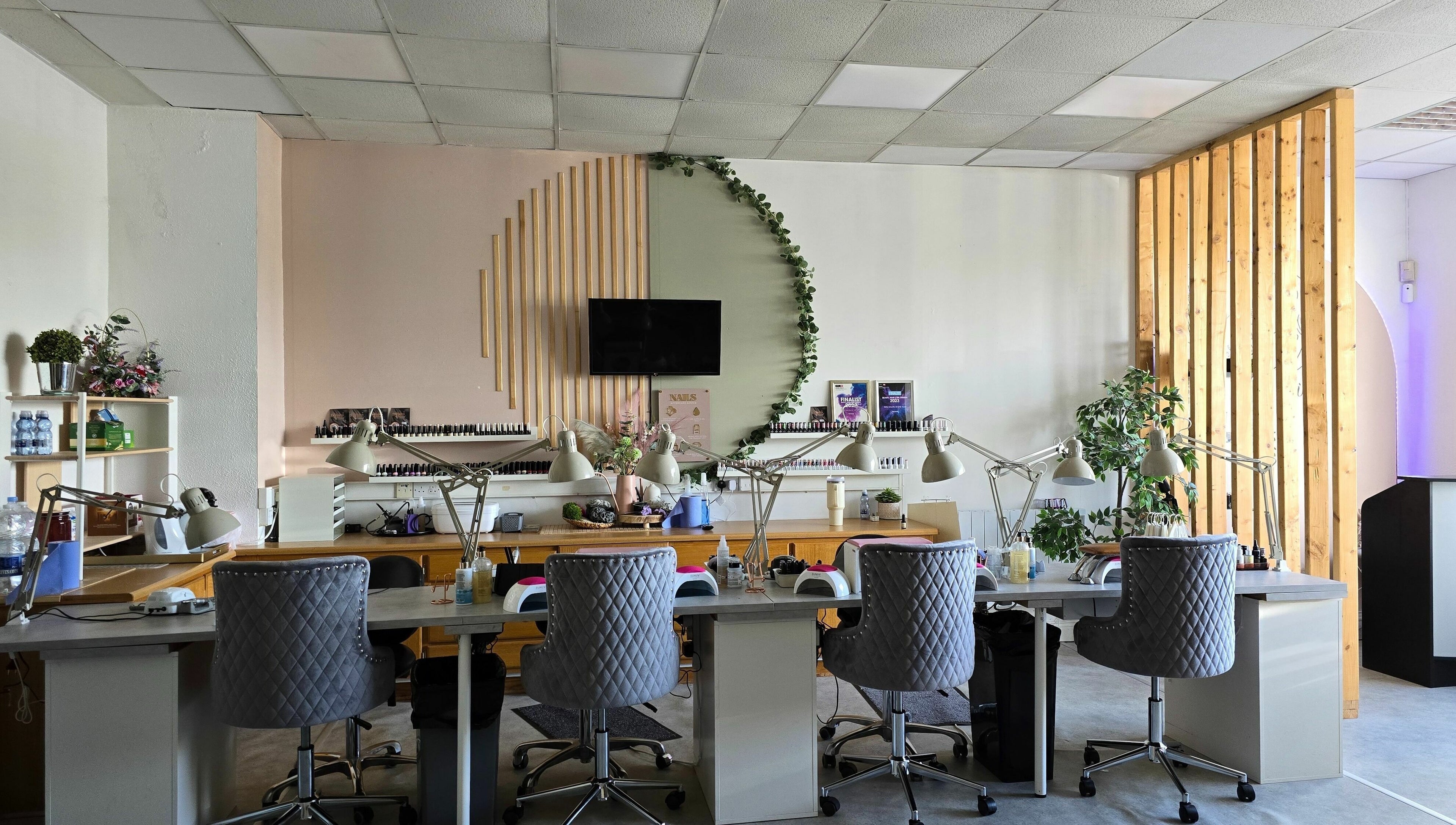 Interior of Fab Nails Thurles in Thurles, County Tipperary, IE, showcasing elegant seating and nail stations.