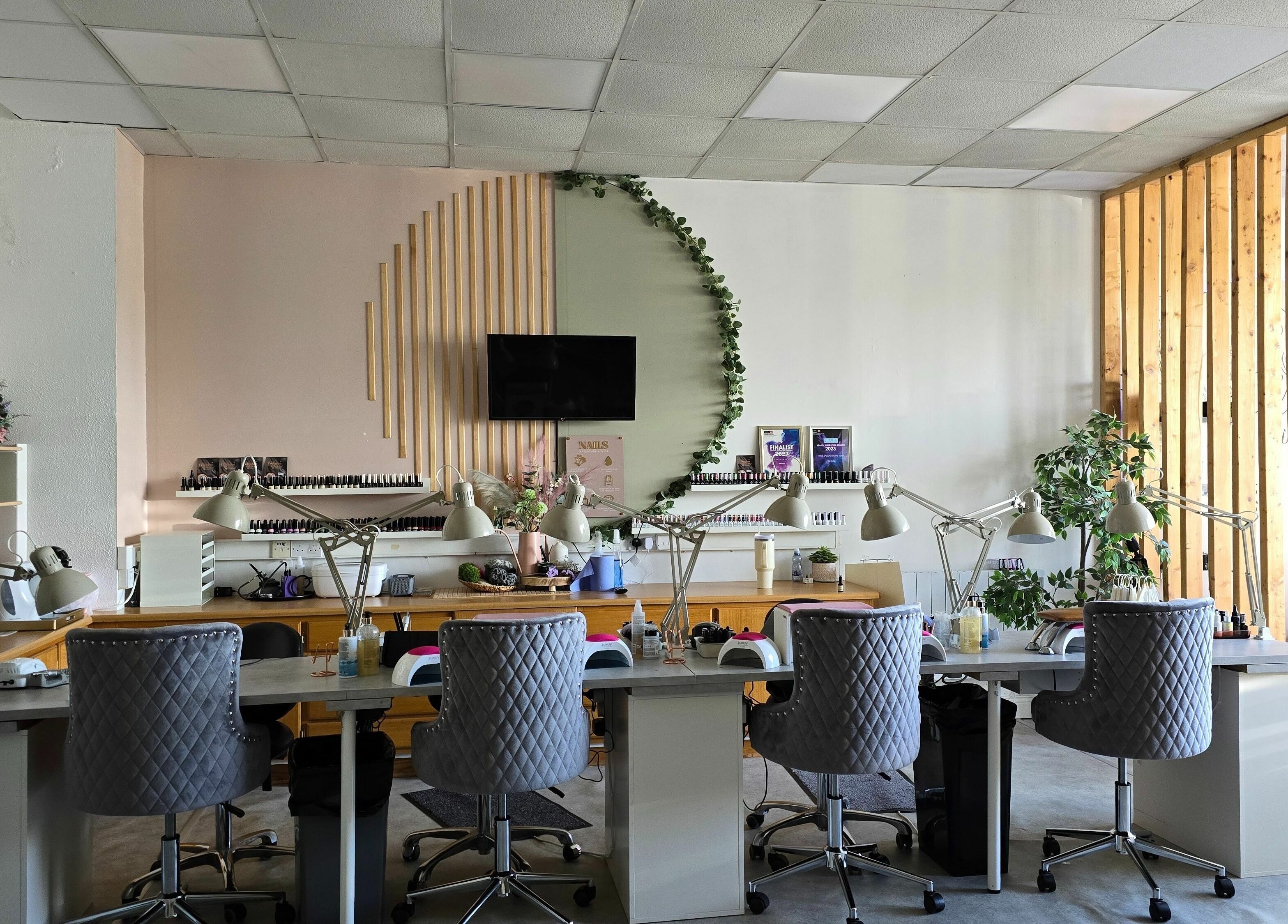 Interior of Fab Nails Thurles in Thurles, County Tipperary, IE, showcasing elegant seating and nail stations.