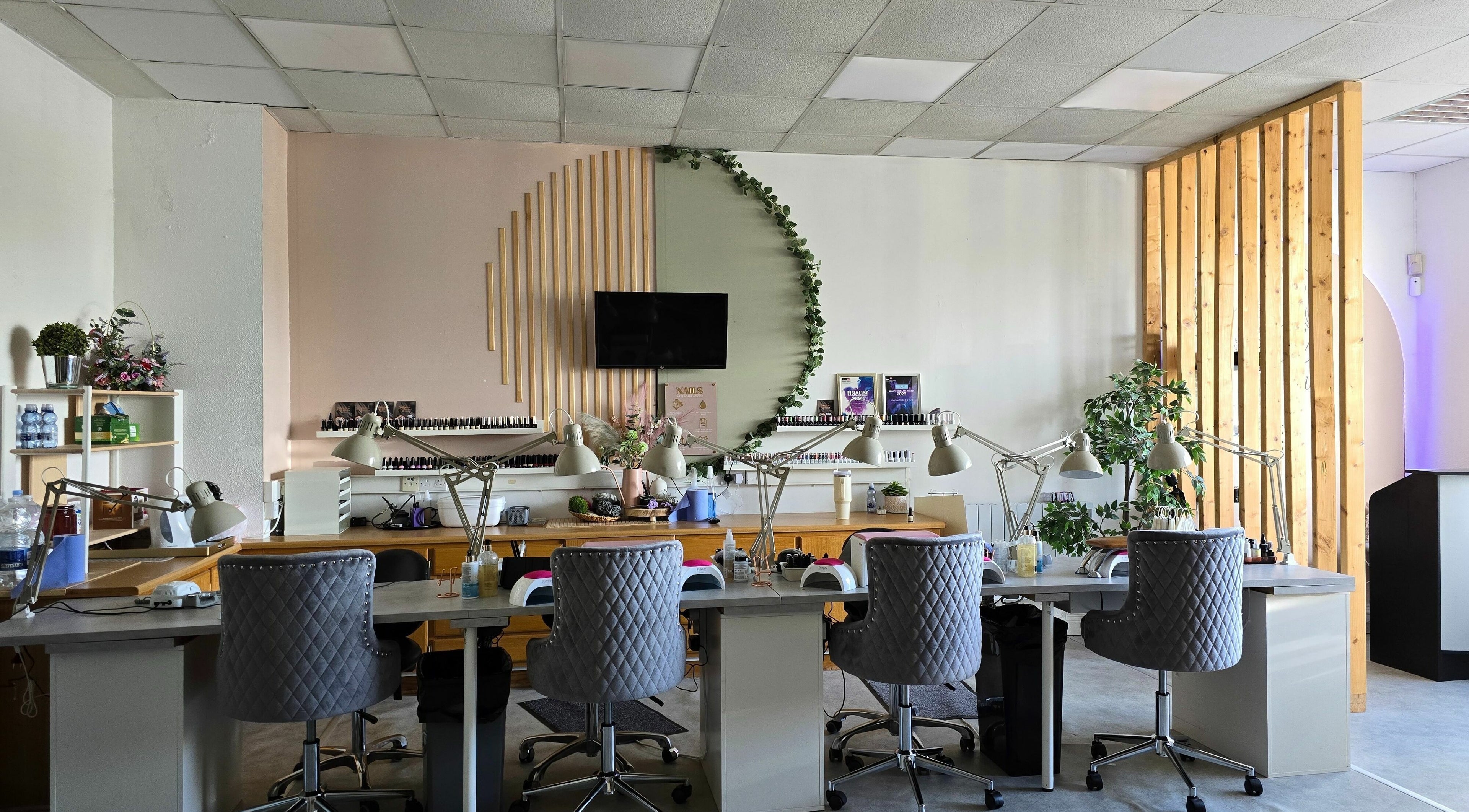 Interior of Fab Nails Thurles in Thurles, County Tipperary, IE, showcasing elegant seating and nail stations.