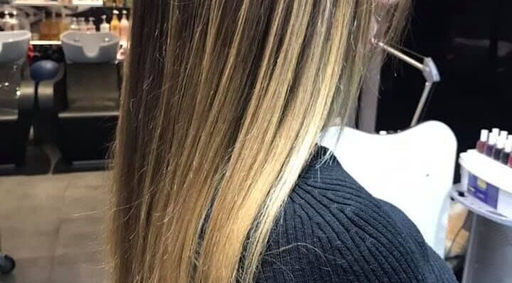 Elegant hair styling at Z! Passion salon in Limassol, Limassol, CY, showcasing vibrant color and sleek finish.