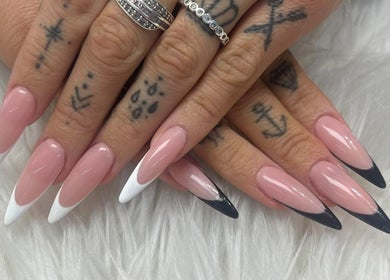 Elegant stiletto nails with dual color design at Beautique Nails and Aesthetics & Co Ltd, Taupō, Waikato, NZ.
