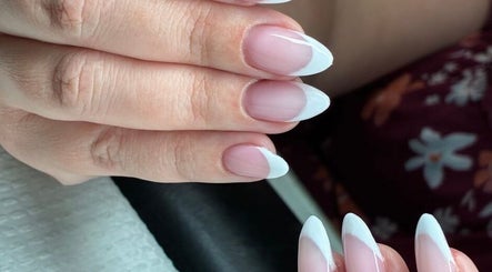 French manicure at Harmony Nail Studio, Freeport, Freeport, BS showcasing elegant nail design.