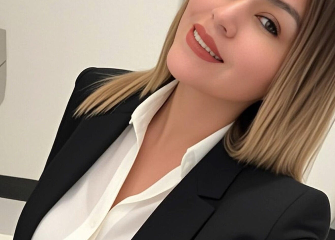 Well-dressed woman at Blossoming Curves Avondale, showcasing stylish business attire in Avondale, Arizona, US.