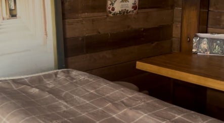 Therapy room at Meganni Franklyn Therapies, Dundee, Scotland. Warm, inviting treatment space.