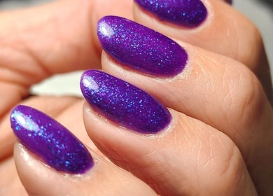 Gorgeous violet gel nails with sparkles at Agnes Beauty Haven, Westhill, Scotland, GB.