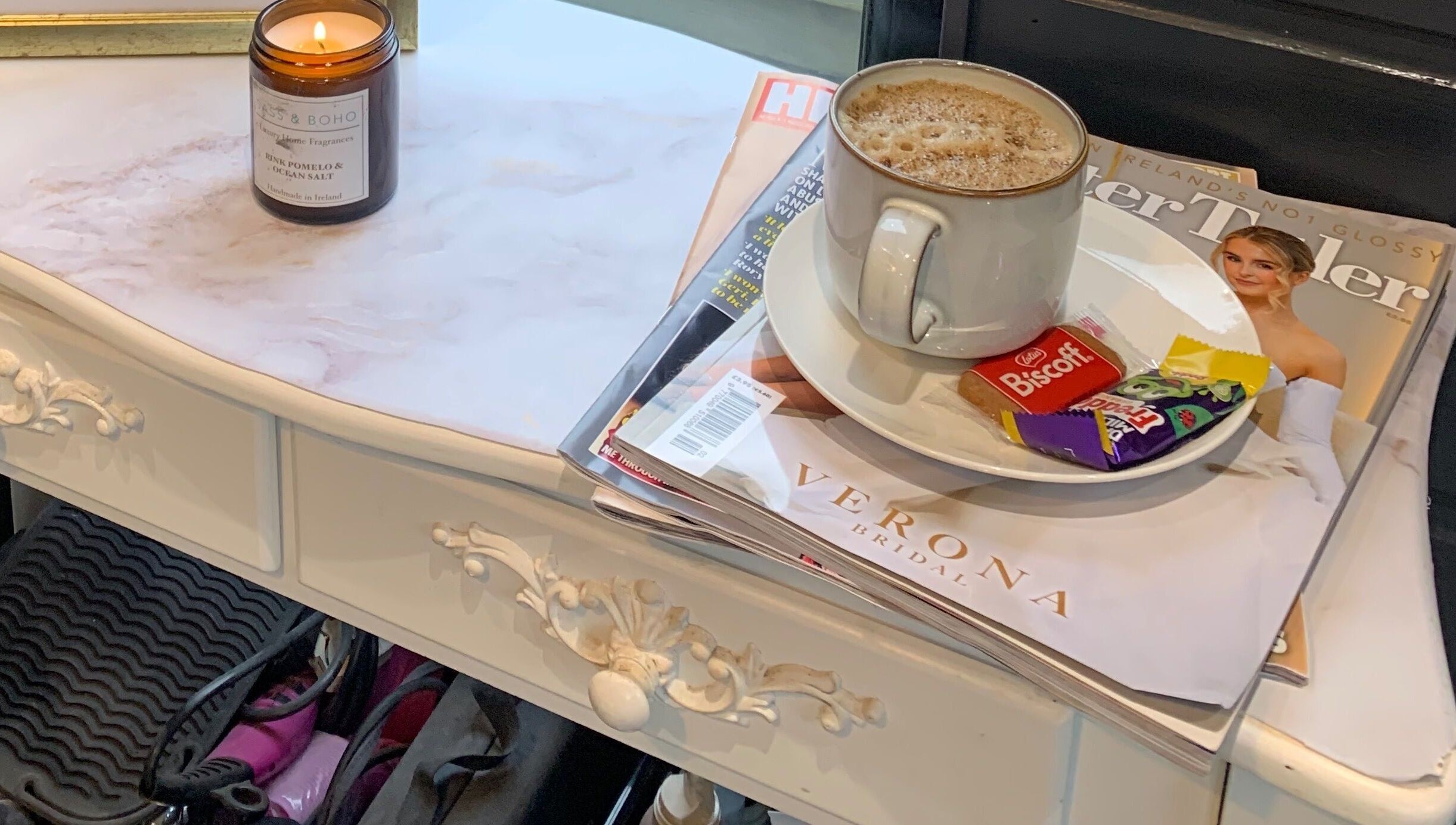 Cozy setup with coffee at Hair At 25, Dungannon, Northern Ireland, GB.