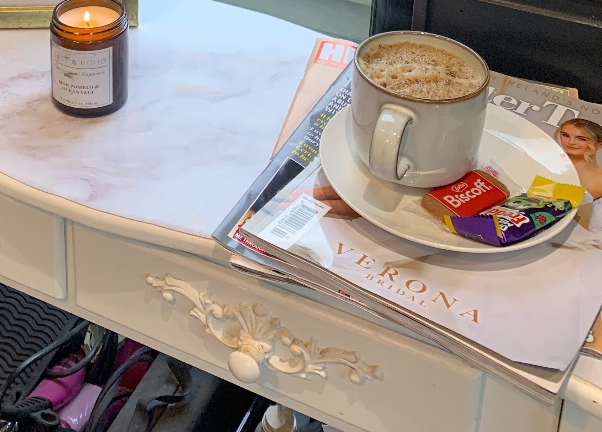 Cozy setup with coffee at Hair At 25, Dungannon, Northern Ireland, GB.