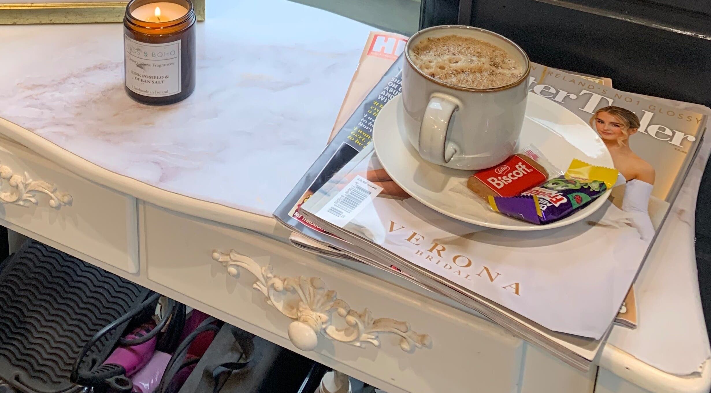 Cozy setup with coffee at Hair At 25, Dungannon, Northern Ireland, GB.
