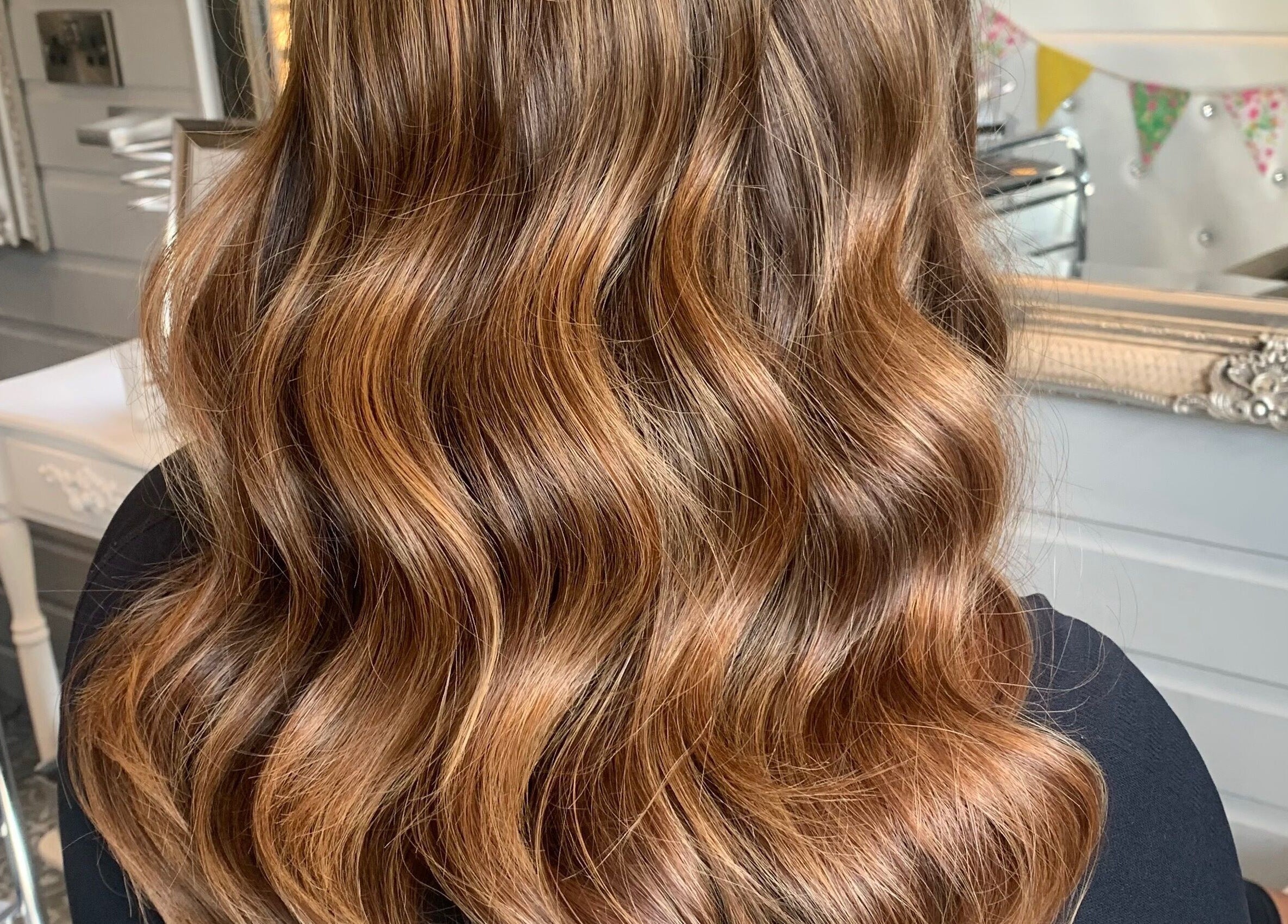 Luxurious golden wavy hairstyle at Hair At 25 in Dungannon, Northern Ireland, GB, reflecting elegance.