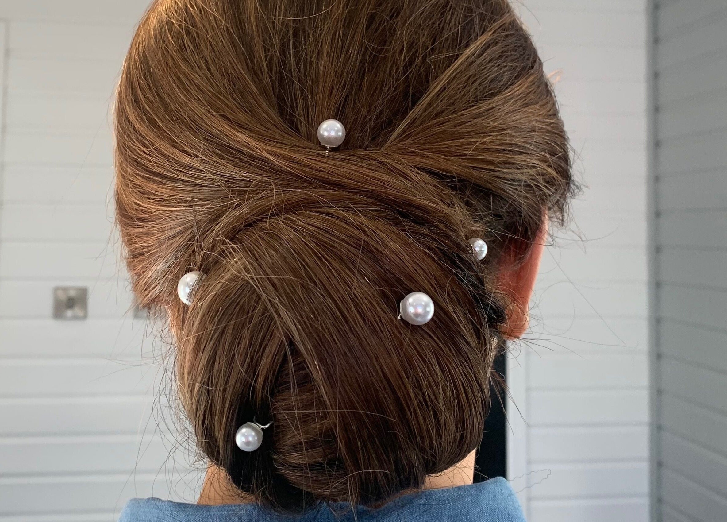 Elegant updo with pearls at Hair At 25, Dungannon, Northern Ireland, GB.