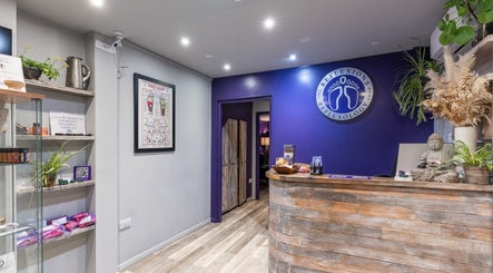 Reception area of Reflexions Bayswater, London, England, GB with a calming decor and natural elements.
