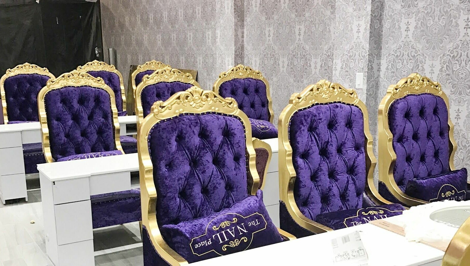 Luxurious purple and gold nail chairs at The Nail Place, Evergreen Park, Illinois, US.
