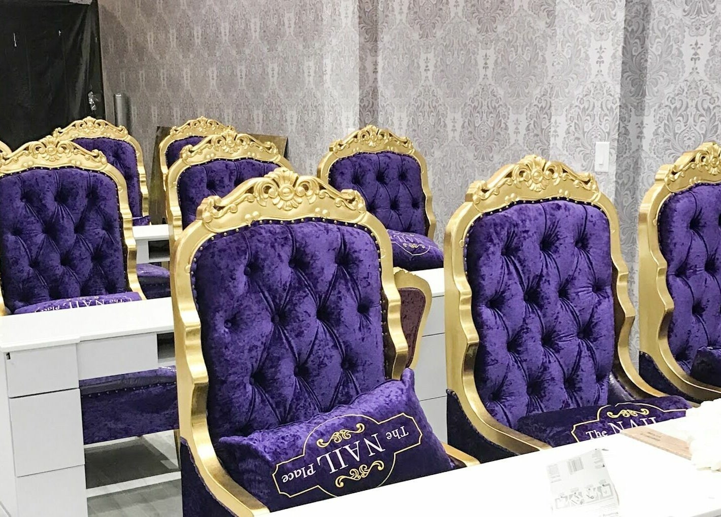 Luxurious purple and gold nail chairs at The Nail Place, Evergreen Park, Illinois, US.