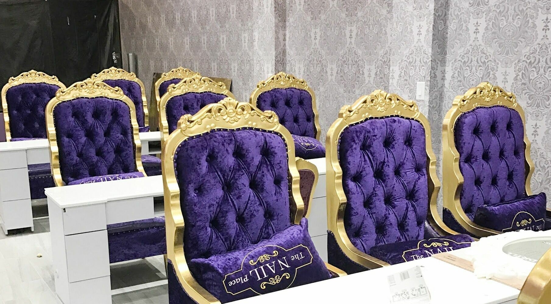 Luxurious purple and gold nail chairs at The Nail Place, Evergreen Park, Illinois, US.