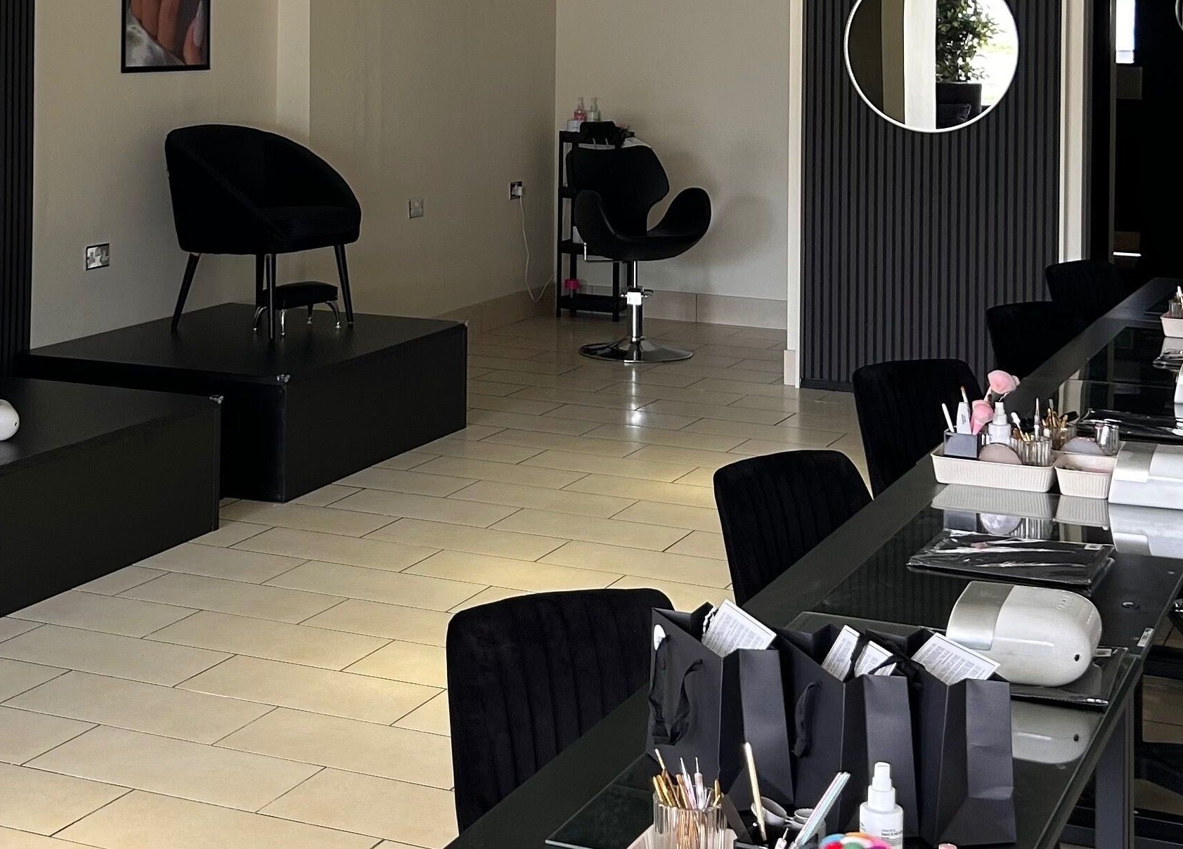 Modern beauty workspace at House of Luxxe Beauty Salon, Yate, England, GB, featuring sleek design and equipment.