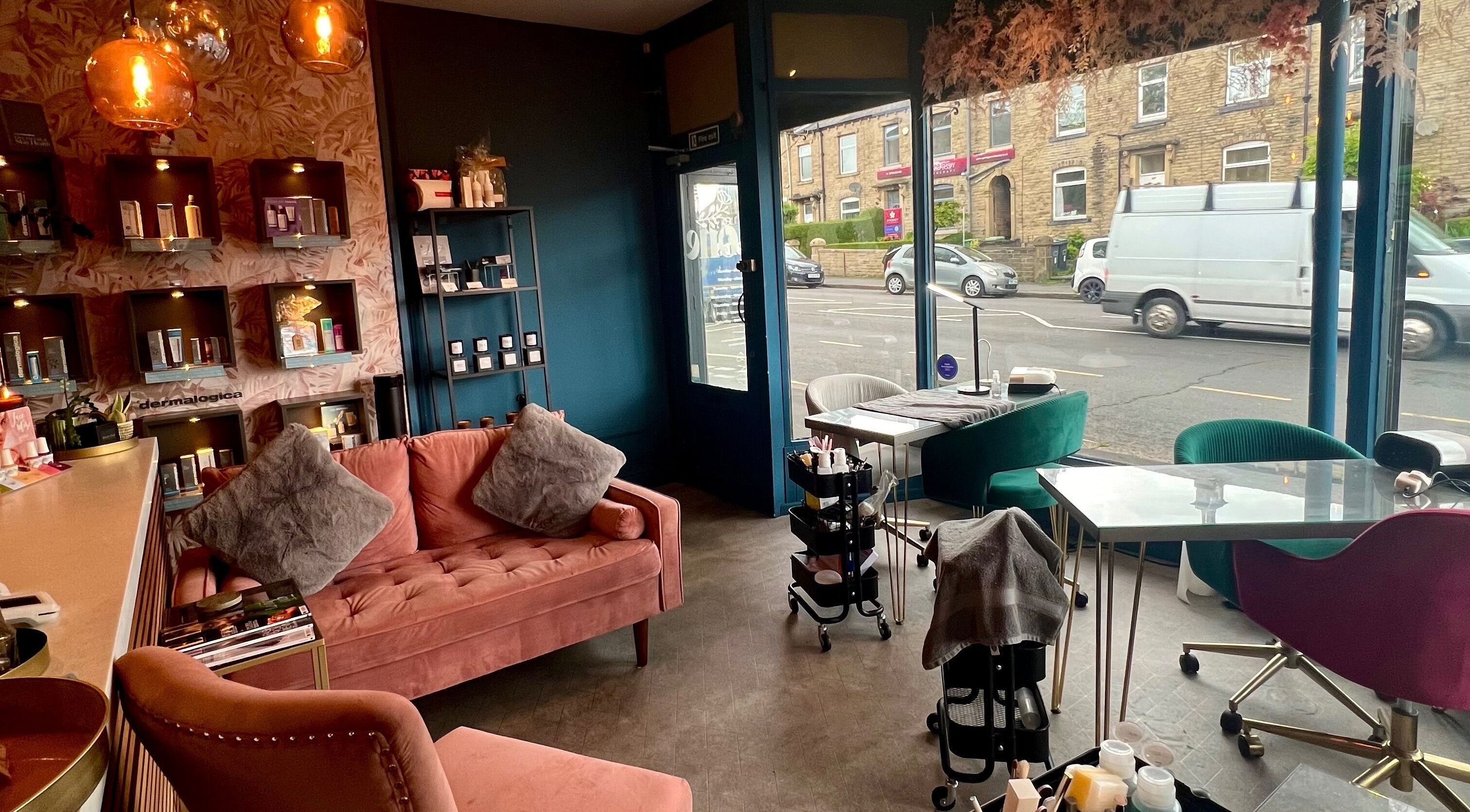 Inside One Beauty Boutique, Huddersfield, England, GB, featuring cozy lounge and modern decor.