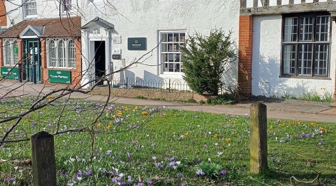 Aestherapy By Sophie Shakira, Knowle, England, GB surrounded by vibrant spring flowers.