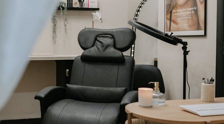 Luxurious salon chair at Sophia Georgiou Salon, Stockport, England, GB, with cozy ambiance and decor.