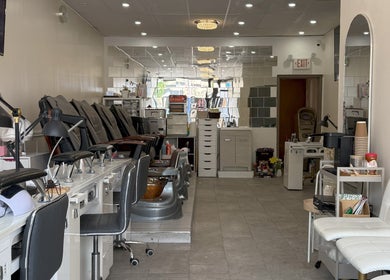 Modern interior of Sarang Nails in Toronto, Ontario, CA showcasing manicure and pedicure stations.