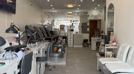 Modern interior of Sarang Nails in Toronto, Ontario, CA showcasing manicure and pedicure stations.
