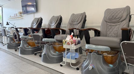 Elegant pedicure chairs at Sarang Nails, Toronto, Ontario, CA, offering top-notch relaxation.