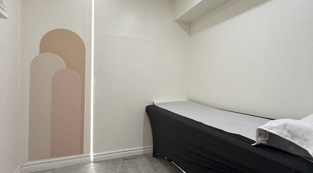Minimalist treatment room at Sarang Nails, Toronto, Ontario, CA. Soft colors and simple design enhance relaxation.