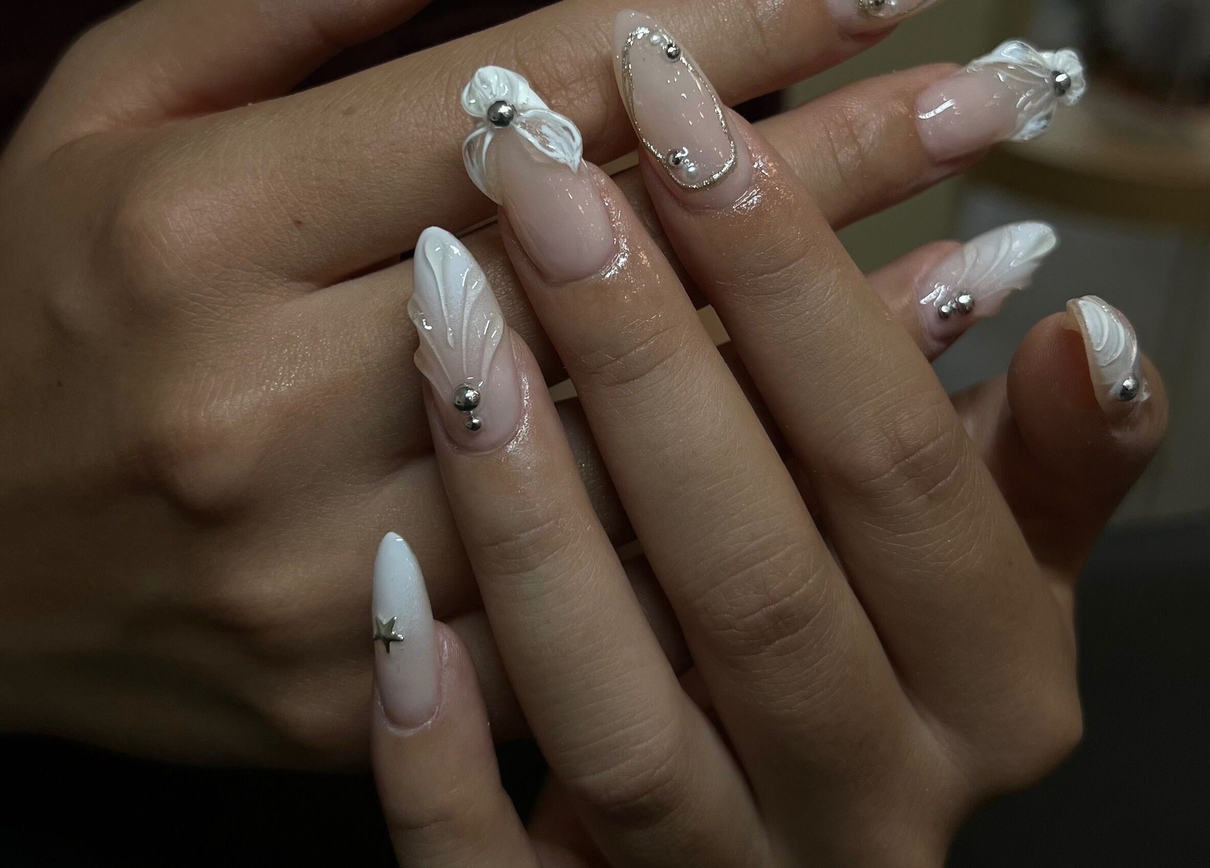 Elegant 3D marble nail art created at Sarang Nails, Toronto, Ontario, CA, showcasing chic nail design.