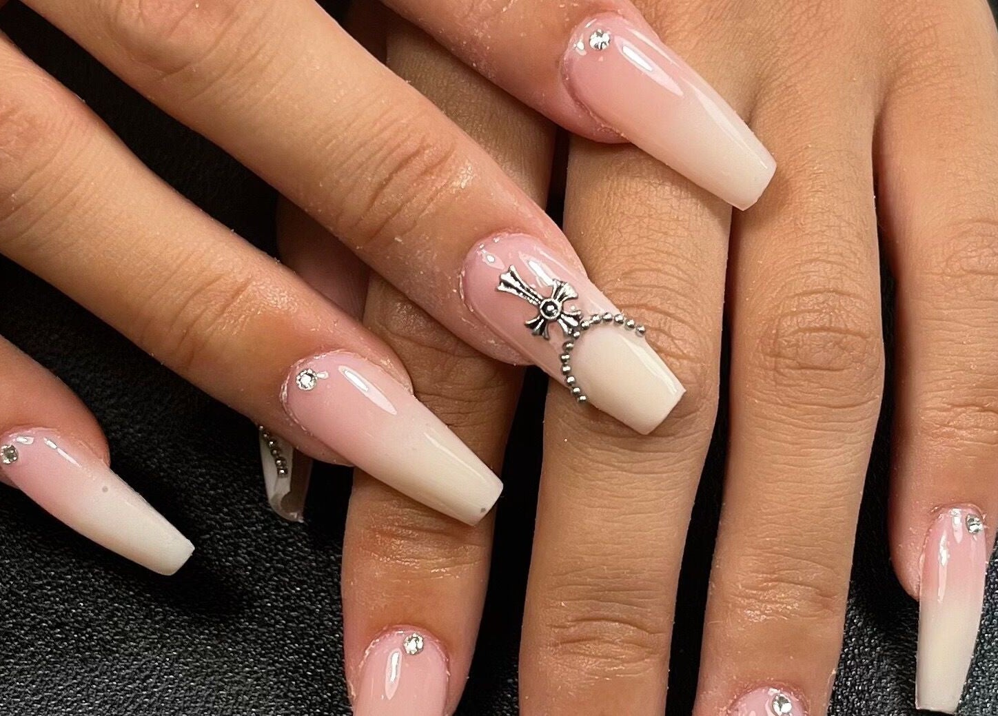 Elegant nail art with rhinestones at Sarang Nails, Toronto, Ontario, CA.