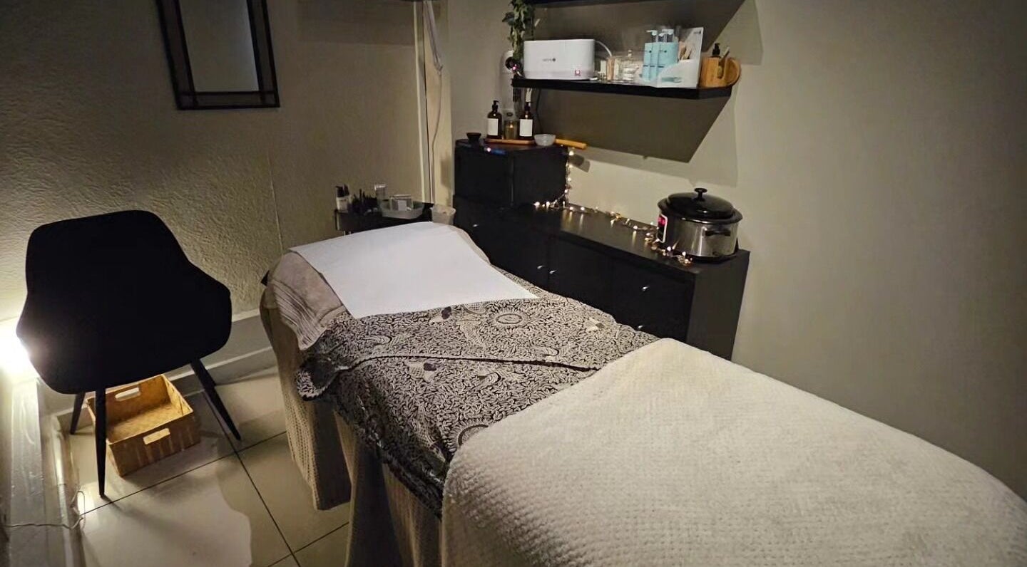 Relaxing therapy room at Divinity - Holistic & Beauty Therapy at HJ Collective, Heywood, England, GB.