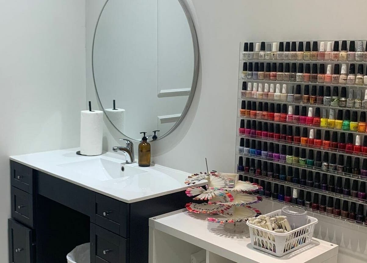 Nail polish display at Nails For You Erin Mills, Mississauga, Ontario, CA showing a variety of colors.