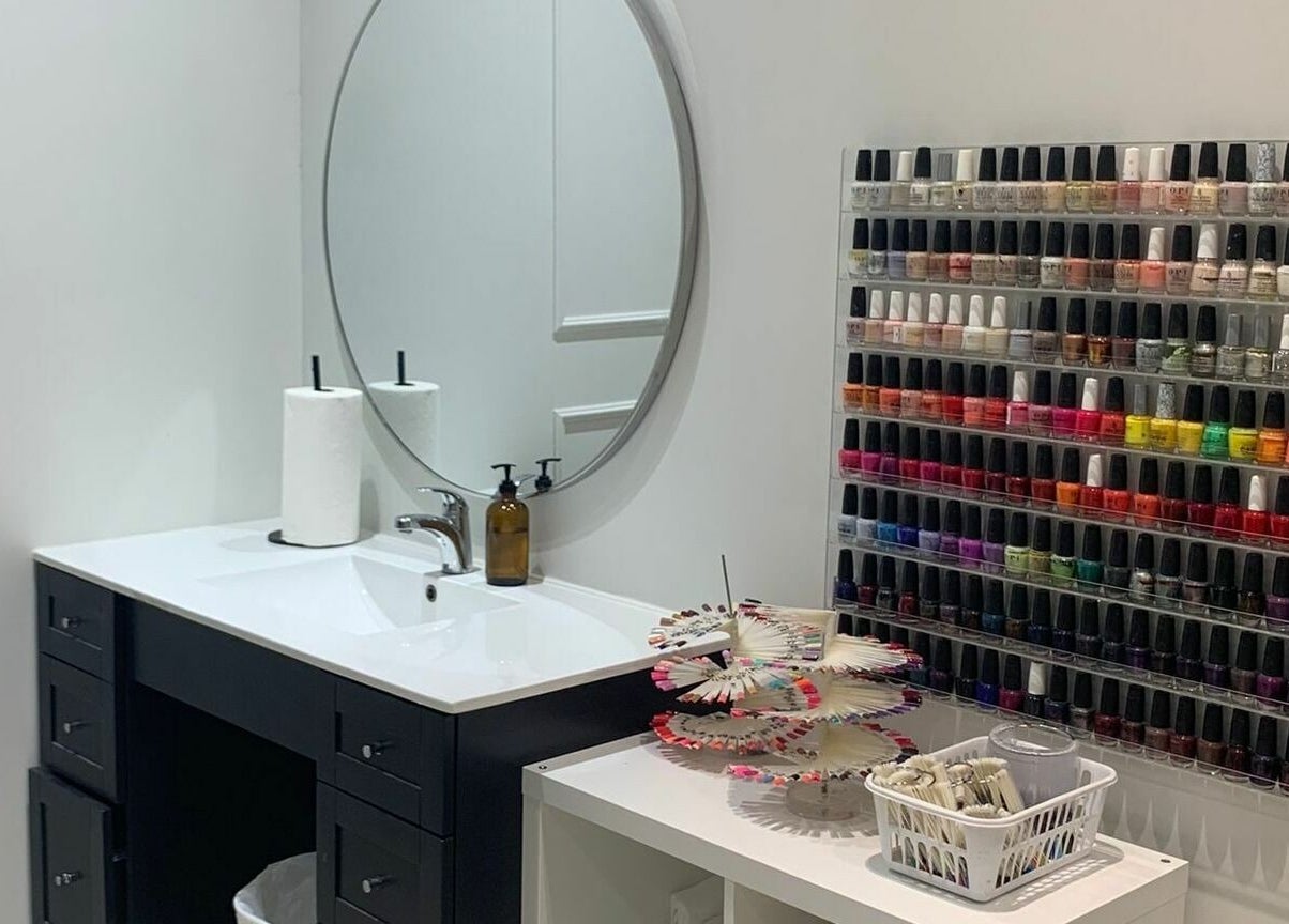 Nail polish display at Nails For You Erin Mills, Mississauga, Ontario, CA showing a variety of colors.