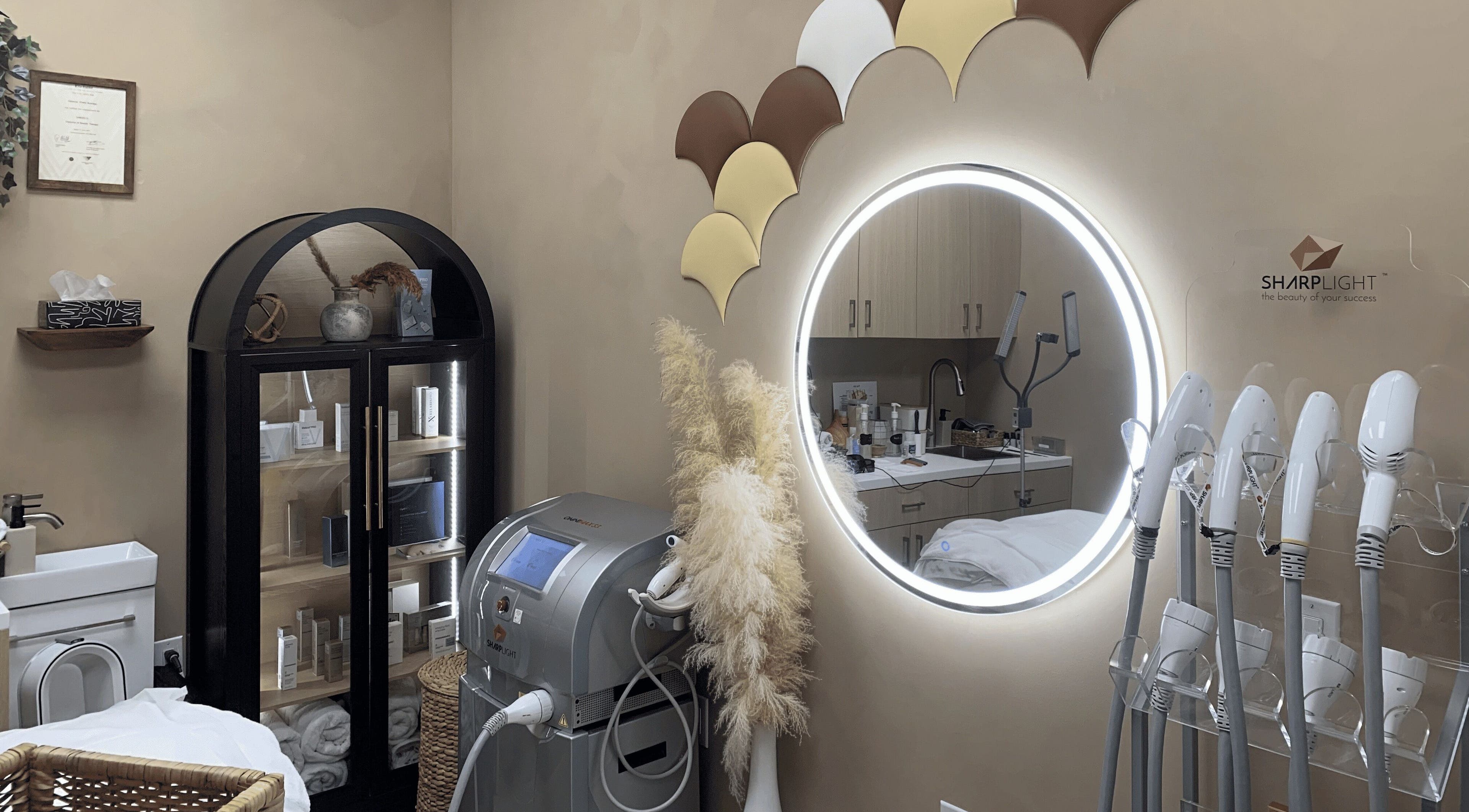 Vertex Aesthetics treatment room in Toronto, Ontario, CA featuring modern equipment and stylish decor.