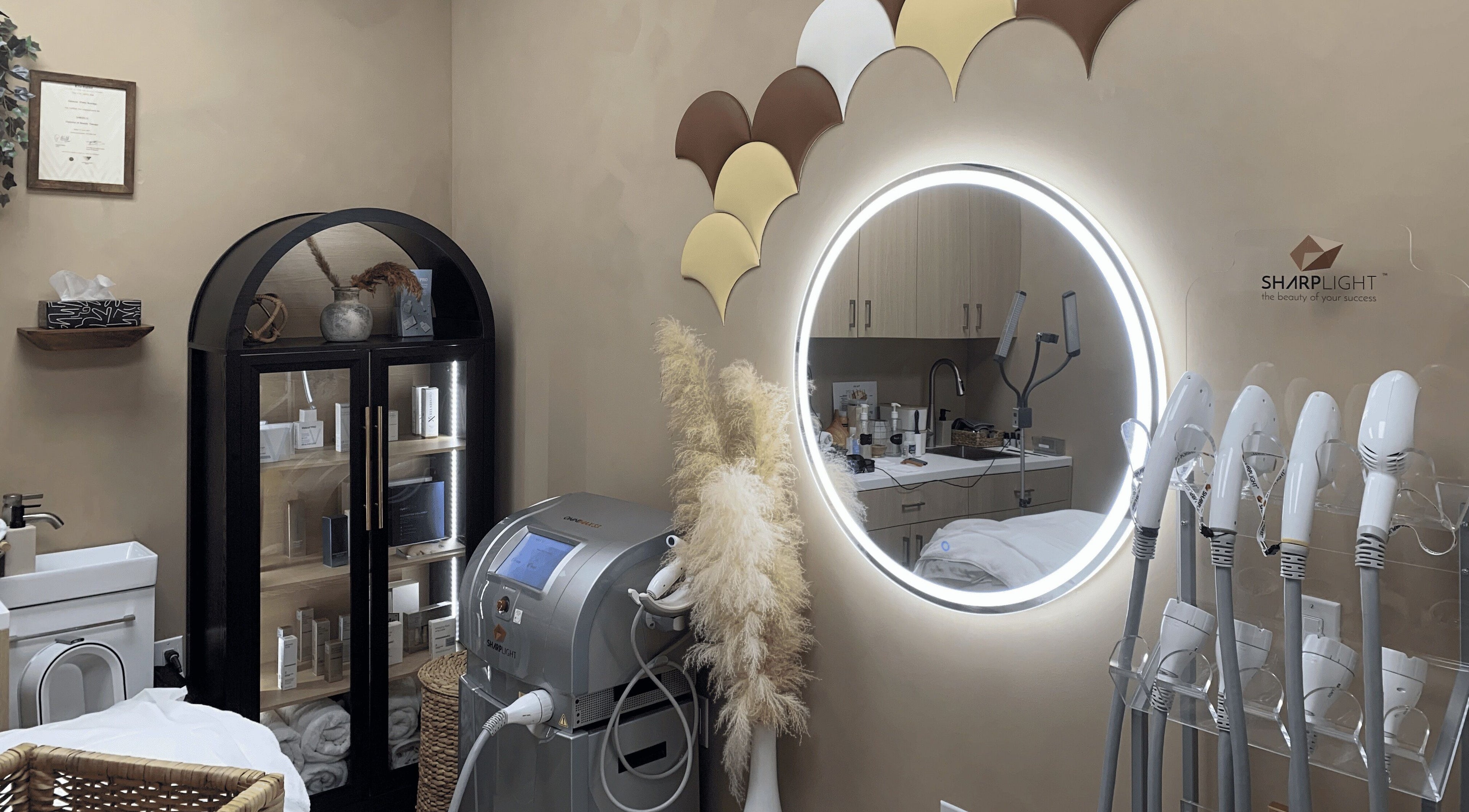 Vertex Aesthetics treatment room in Toronto, Ontario, CA featuring modern equipment and stylish decor.