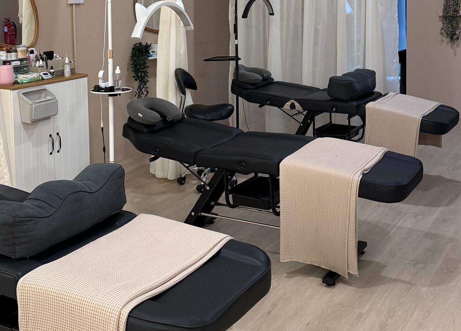 Comfortable treatment beds at Abby Beaute Studio, Cyberjaya, Selangor, MY, providing a serene atmosphere.