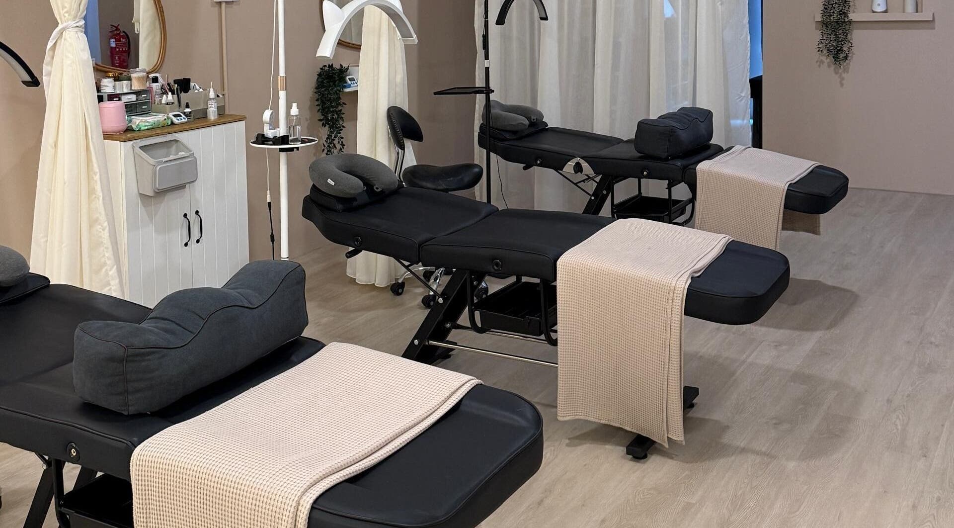 Comfortable treatment beds at Abby Beaute Studio, Cyberjaya, Selangor, MY, providing a serene atmosphere.