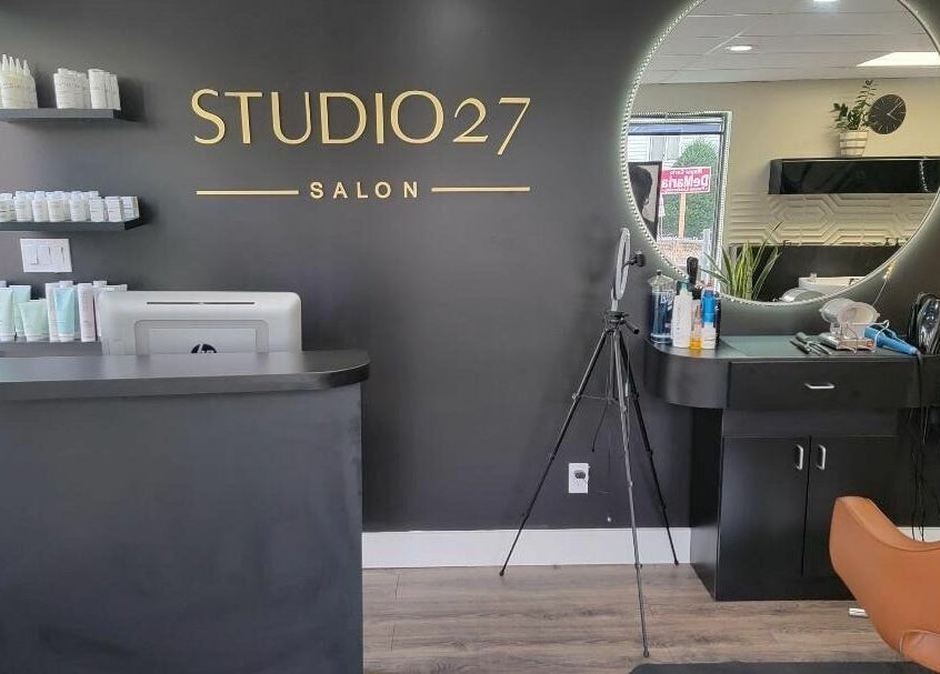 Reception area at STUDIO 27 SALON in Everett, Massachusetts, US with modern decor and professional styling tools.