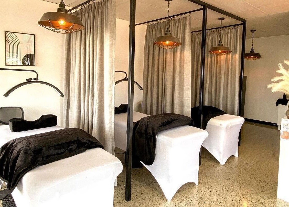 Luxurious treatment rooms at All-Eyes Beauty in Falcon, Western Australia, AU with elegant decor and plush beds.