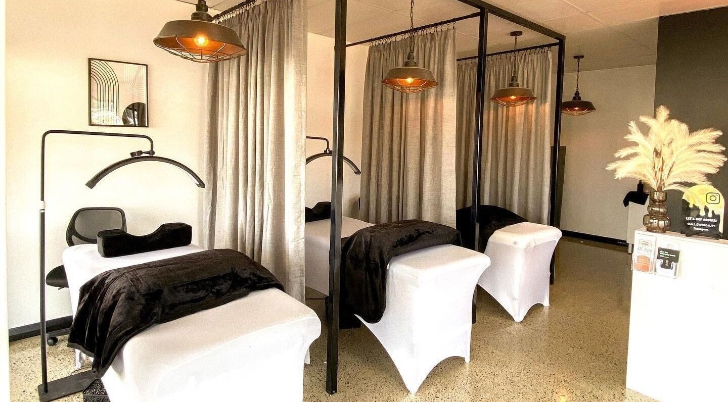 Luxurious treatment rooms at All-Eyes Beauty in Falcon, Western Australia, AU with elegant decor and plush beds.