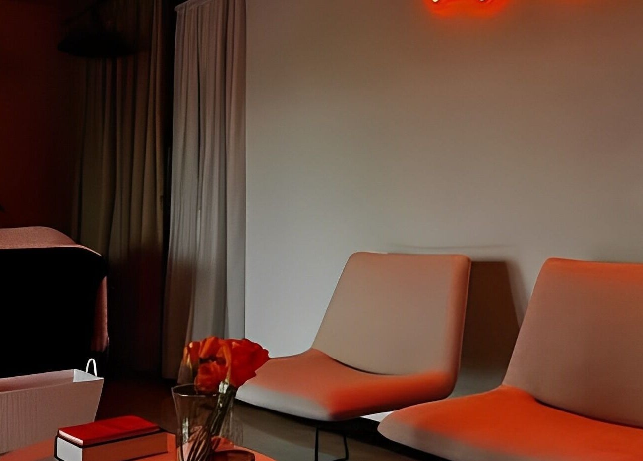 Relaxing lounge area at All-Eyes Beauty, Falcon, Western Australia, AU with chairs and ambient lighting.