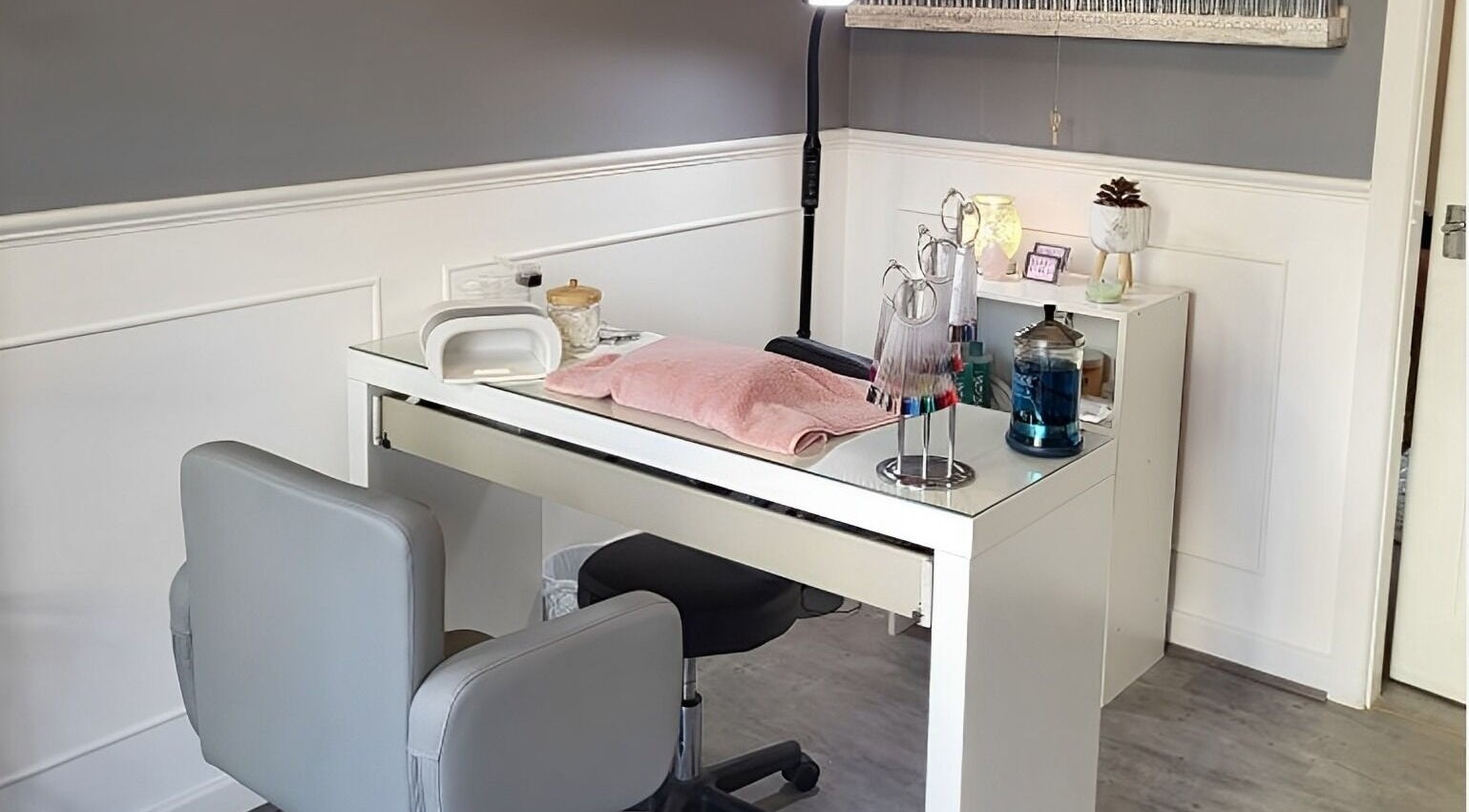 Elegant nail station at Beauty at No.35 in Clevedon, England, GB, featuring modern decor and nail care tools.